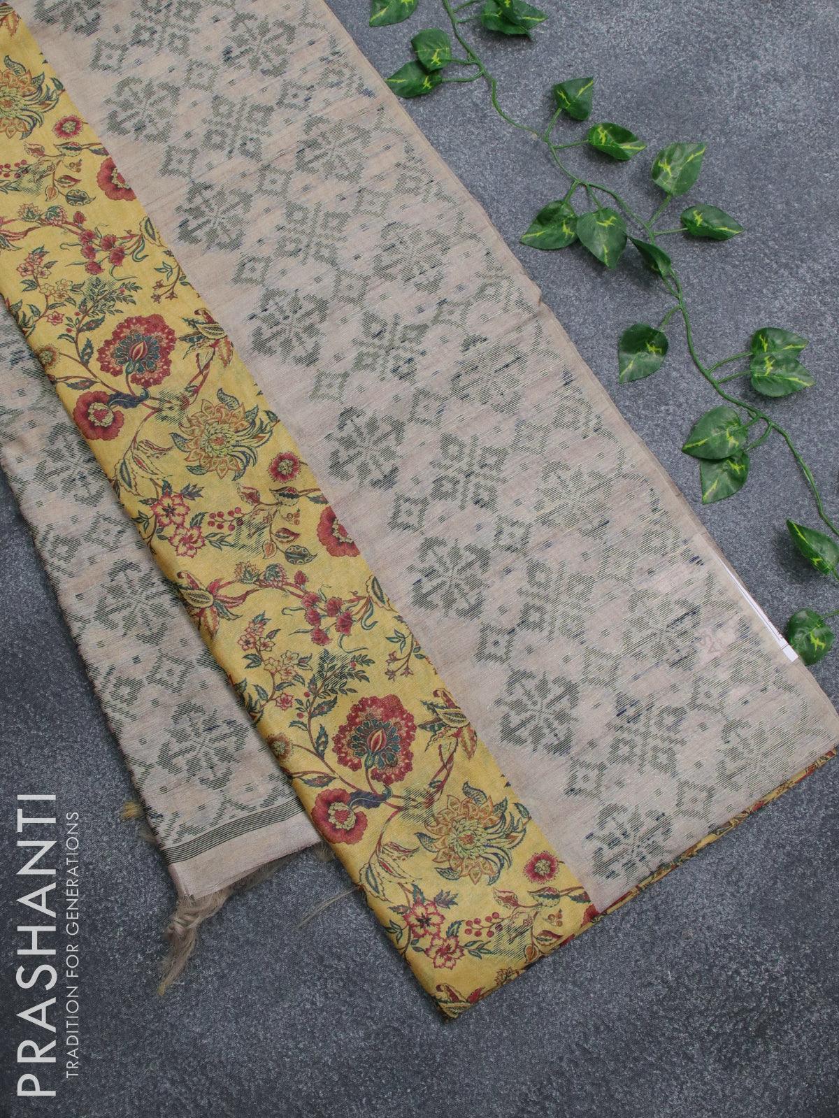 Semi jute silk saree orange and beige with allover floral prints woven buttas and woven border
