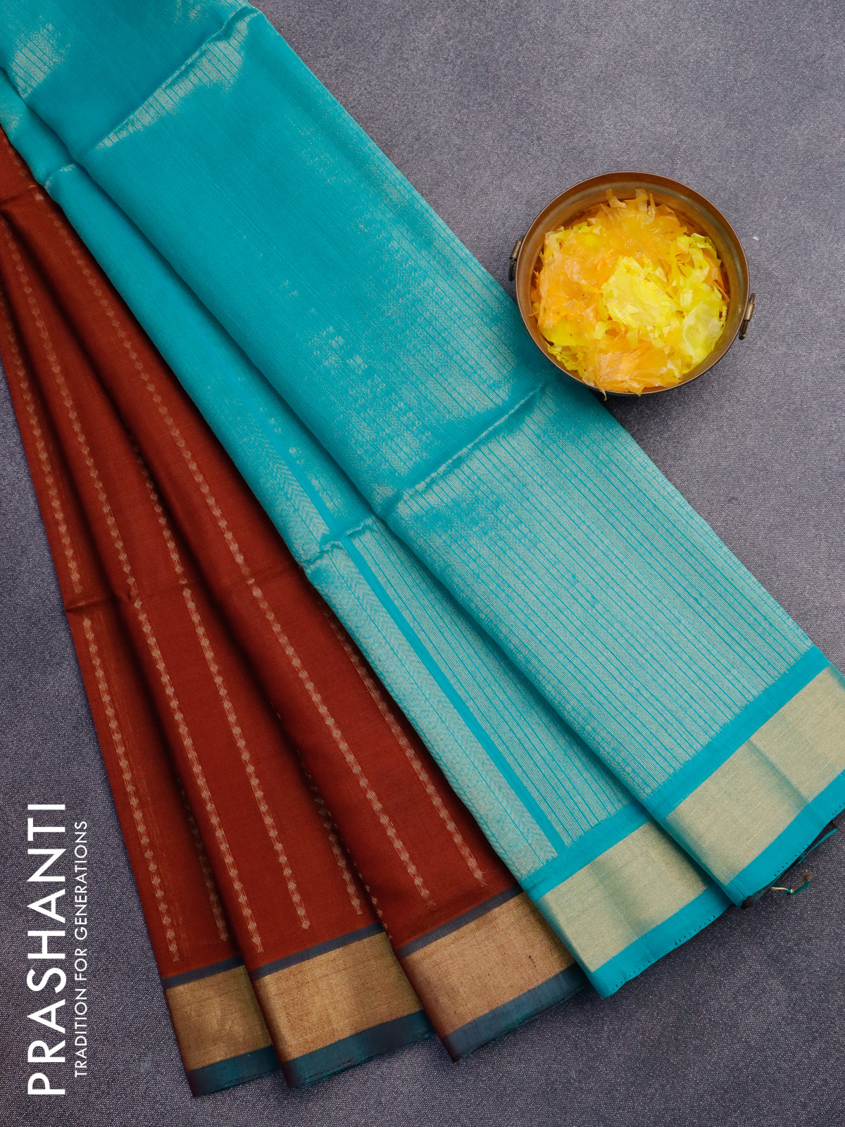 Kora silk cotton saree rust shade and teal blue with allover zari weaves and zari woven border