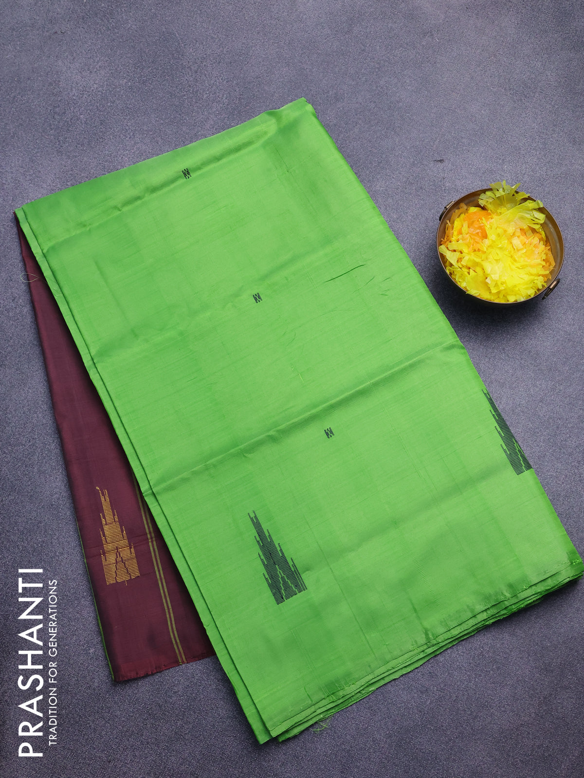 Banana pith saree parrot green and maroon with thread woven buttas in borderless style