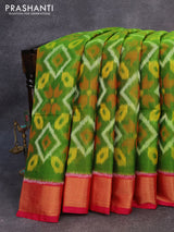 Ikat silk cotton saree green and dual shade of pink with allover ikat weaves and zari woven border