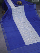 Semi tussar saree off white and blue with madhubani prints & zari buttas and zari woven border