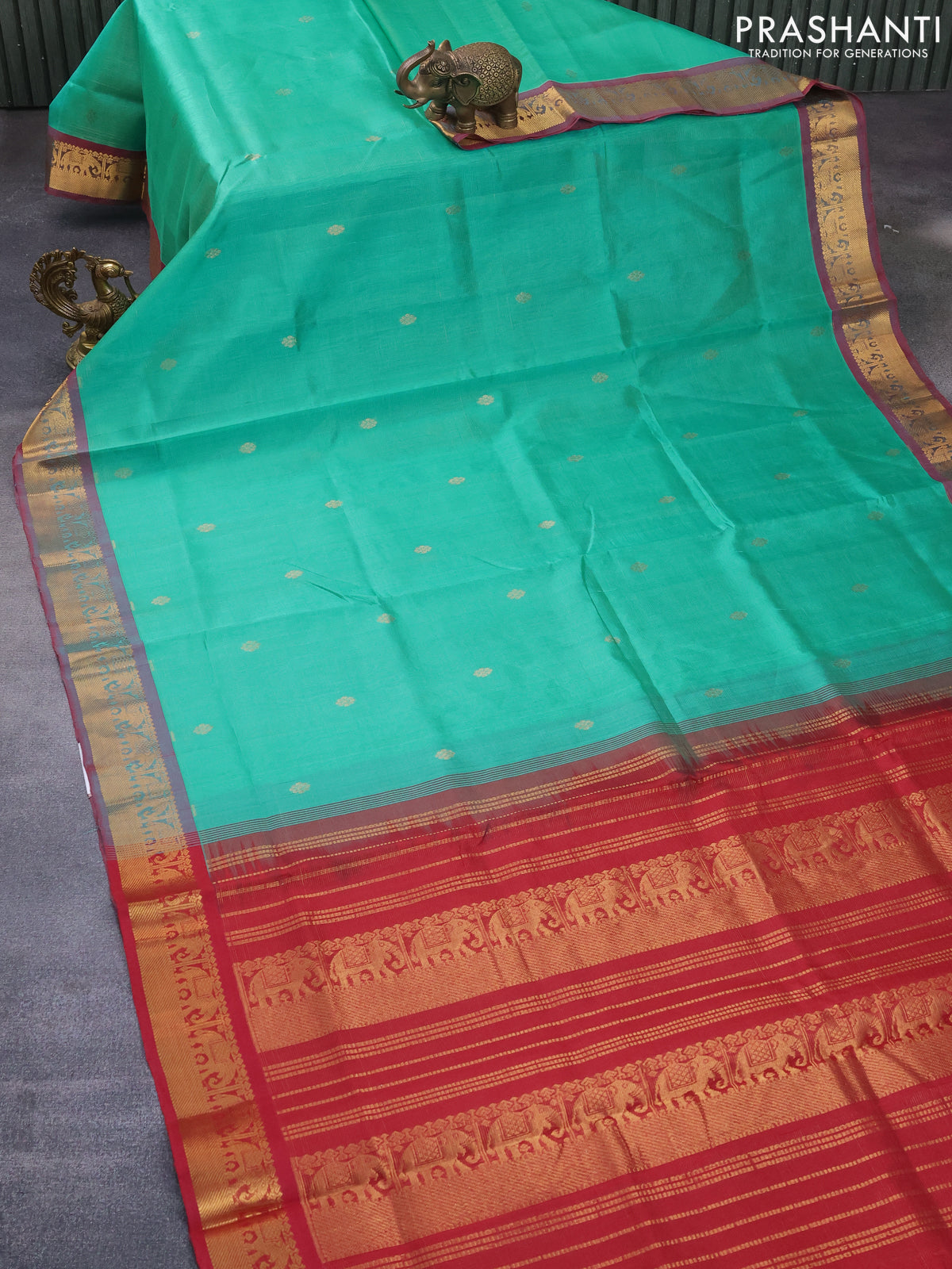 Silk cotton saree teal green and maroon with allover vairaosi pattern & buttas and elephant zari woven border