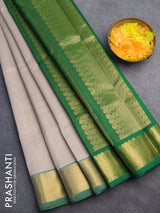 Silk cotton saree pastel grey and green with allover vairaosi pattern and zari woven border