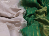 Silk cotton saree pastel grey and green with allover vairaosi pattern and zari woven border