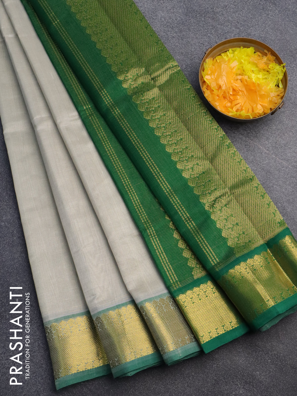 Silk cotton saree grey and green with allover vairaosi pattern and zari woven border