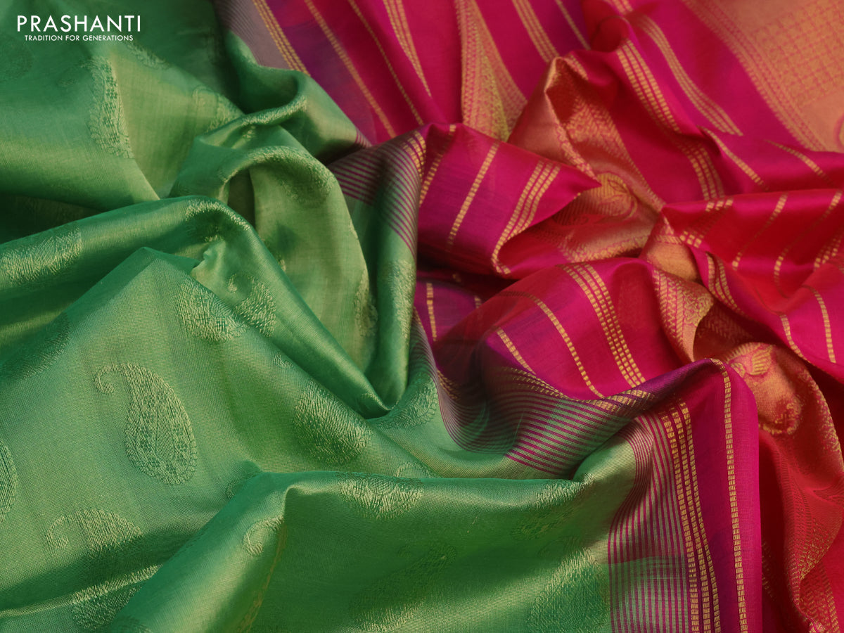 Silk cotton saree green shade and magenta pink with allover self emboss jacquard and rich zari woven border