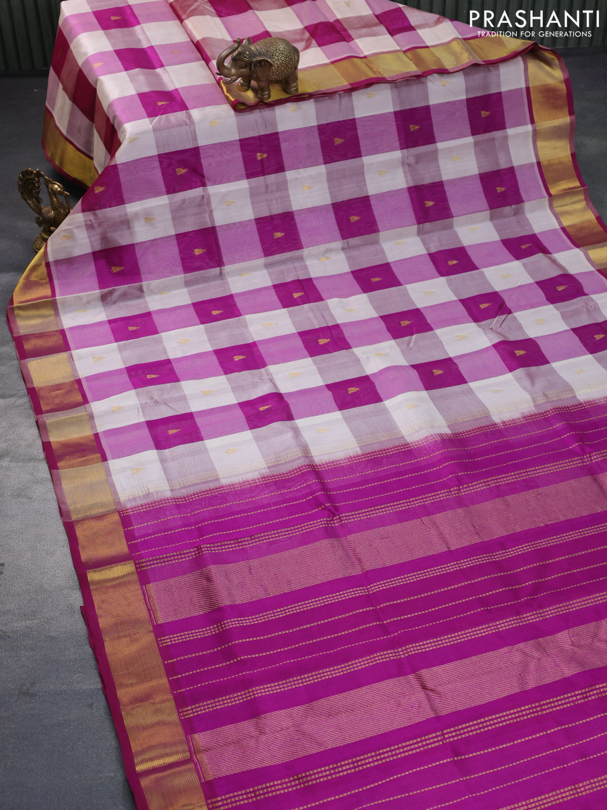 Silk cotton saree cream and purple with allover paalum pazhamum checks & temple zari buttas and zari woven border