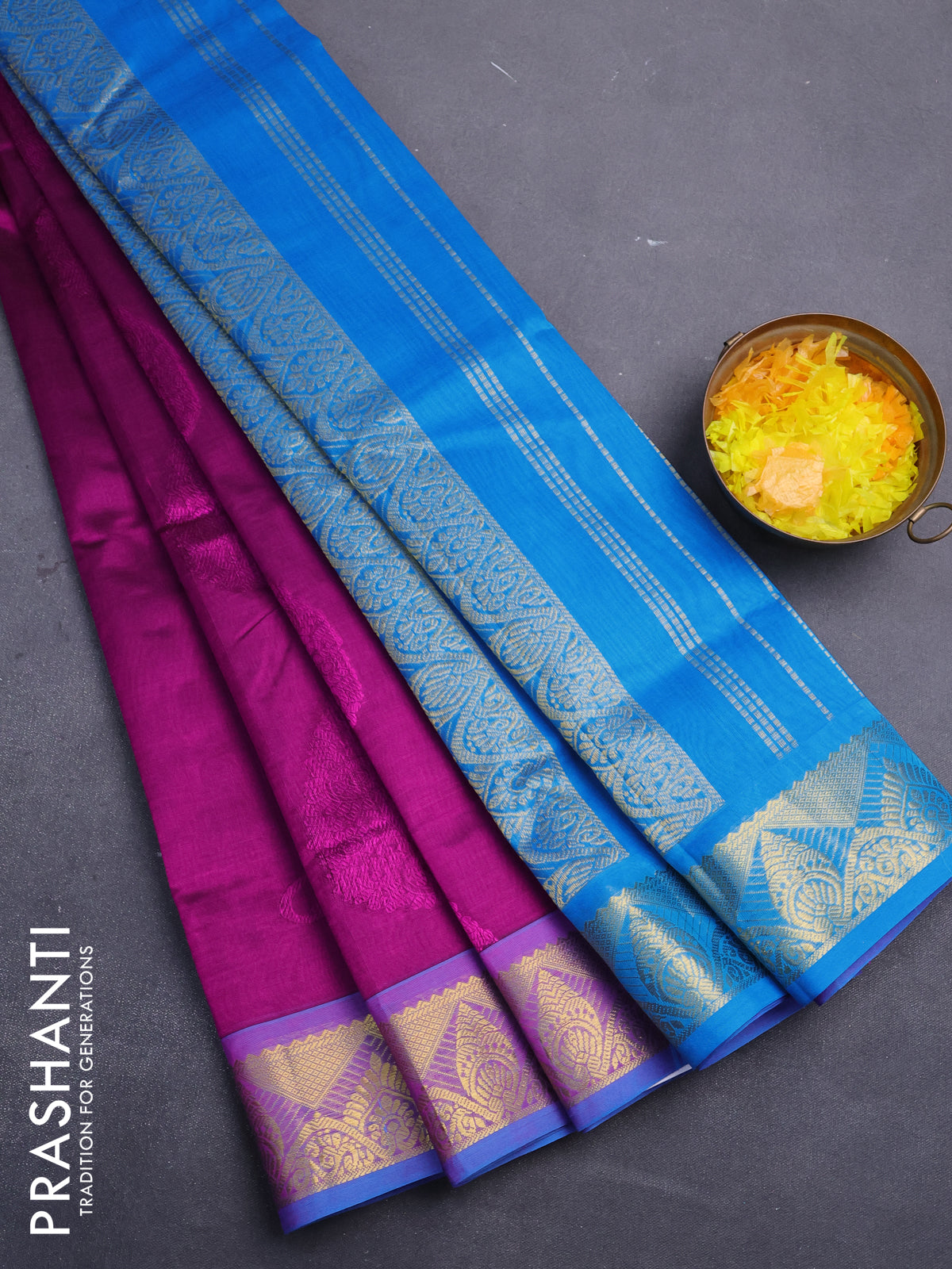 Silk cotton saree purple and cs blue with allover self emboss jacquard and rich zari woven border