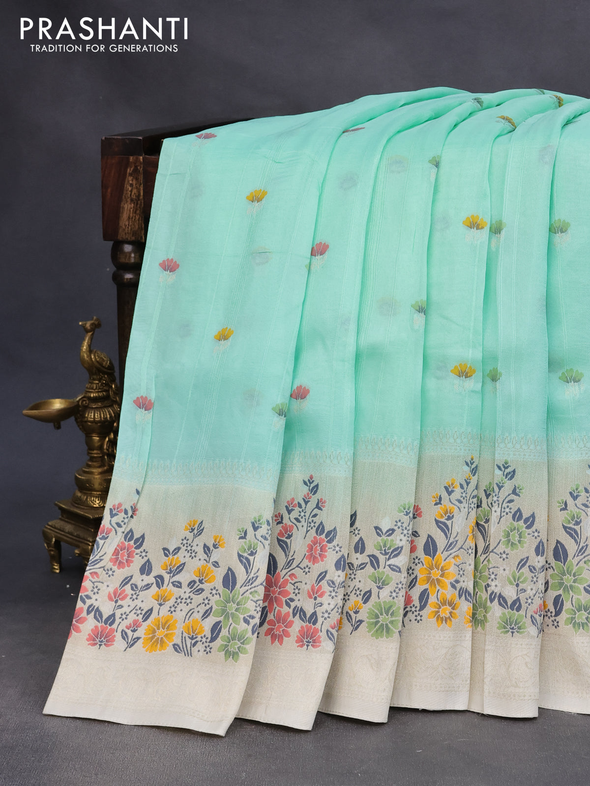 Raw silk saree pastel blue and cream with floral prints & zari buttas and zari woven floral paithani border