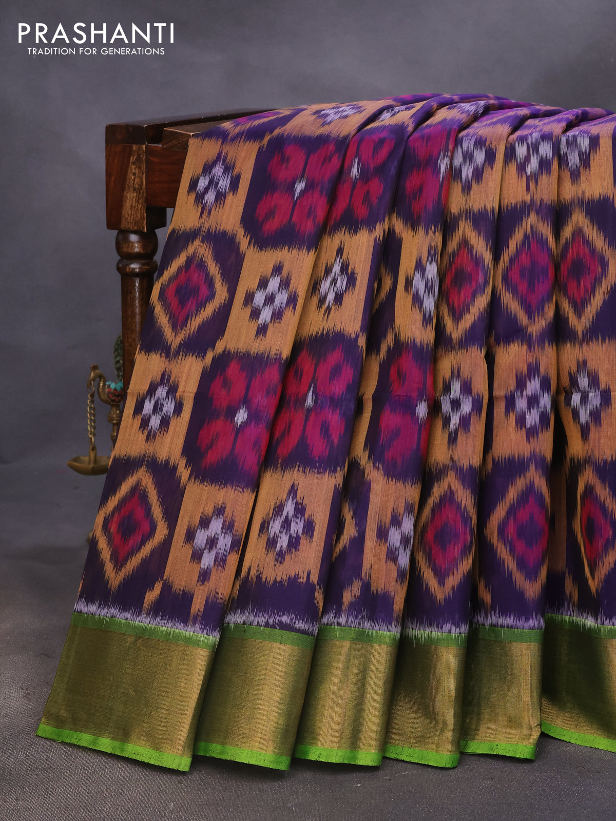 Ikat silk cotton saree blue and light green with allover ikat weaves and zari woven border