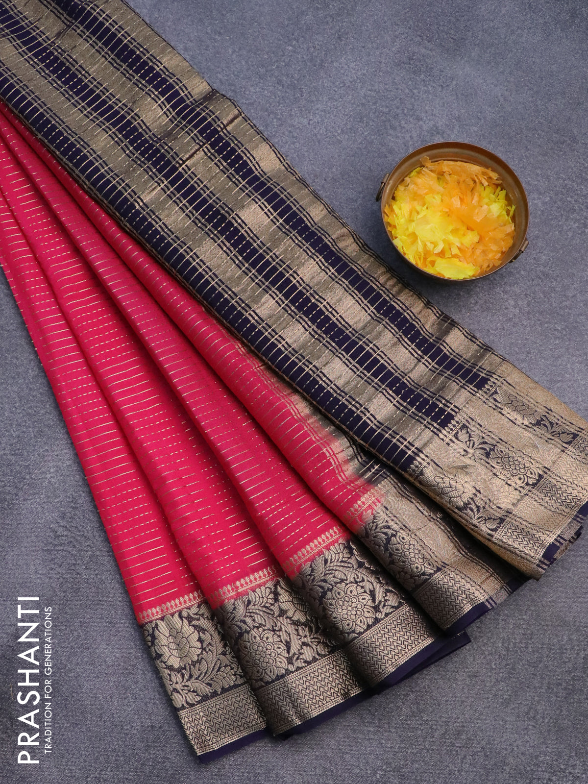 Semi crepe saree pink and navy blue with allover zari weaves and zari woven border