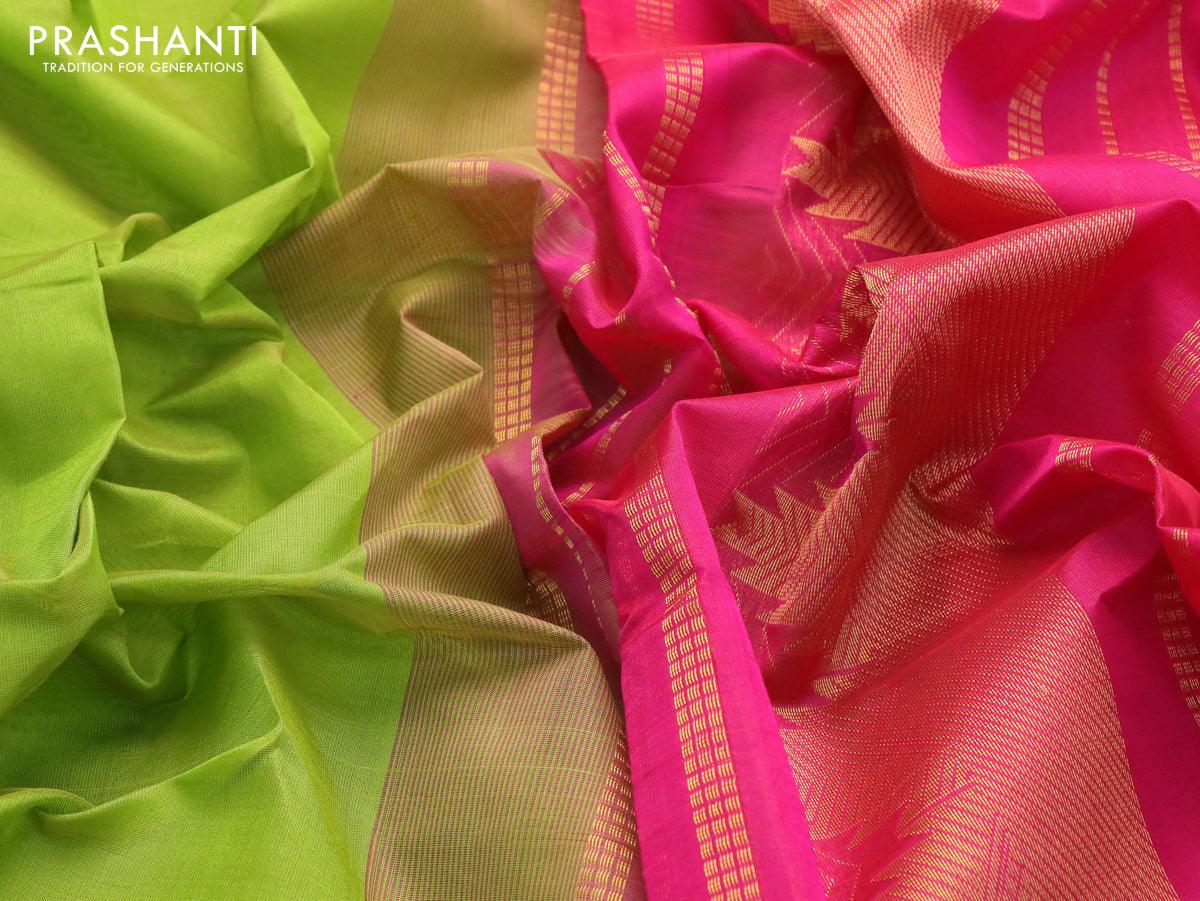 Silk cotton saree light green and pink with plain body and temple design zari woven border